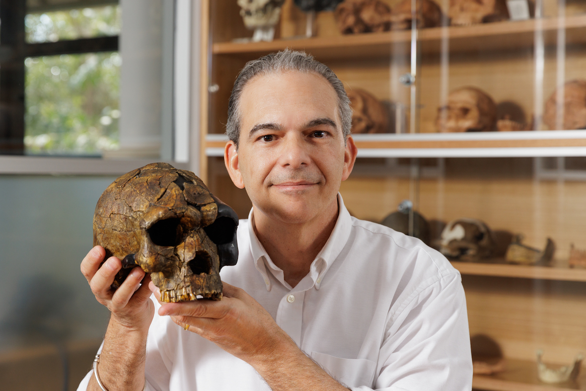 Professor Michael Petraglia with skull